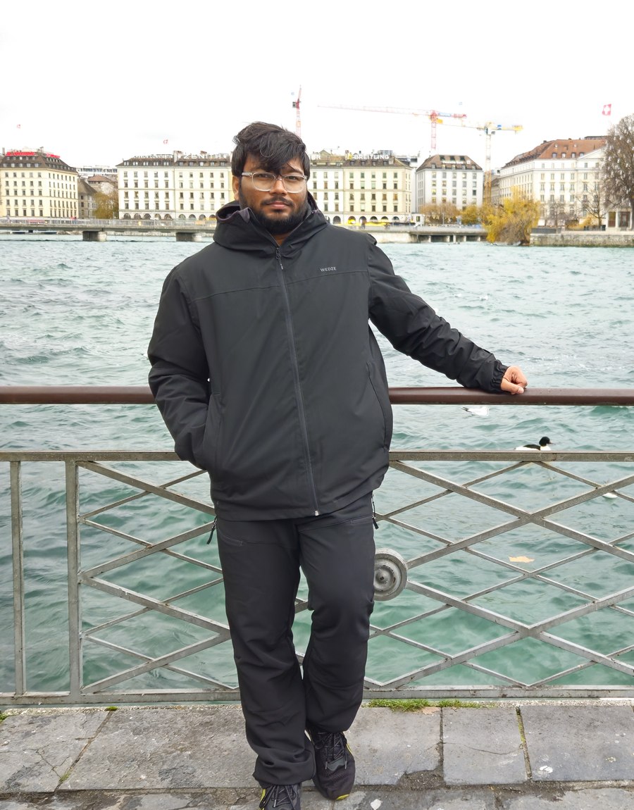 Deependra Sharma standing beside the waterfront in Geneva